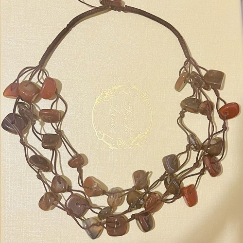 Three-row necklace with brown and deep red stones