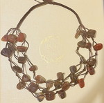 Three-row necklace with brown and deep red stones