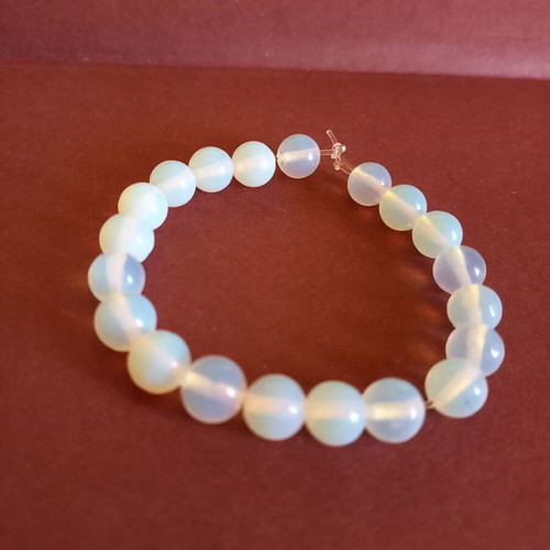 White bracelet with opal beads new