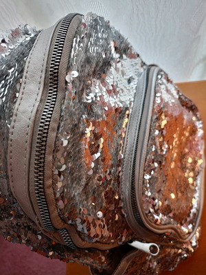 Lame backpack like new, silver