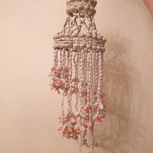 Hanging decoration for balcony used, made of shells