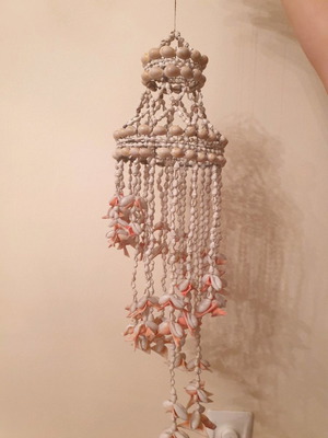 Hanging decoration for balcony used, made of shells