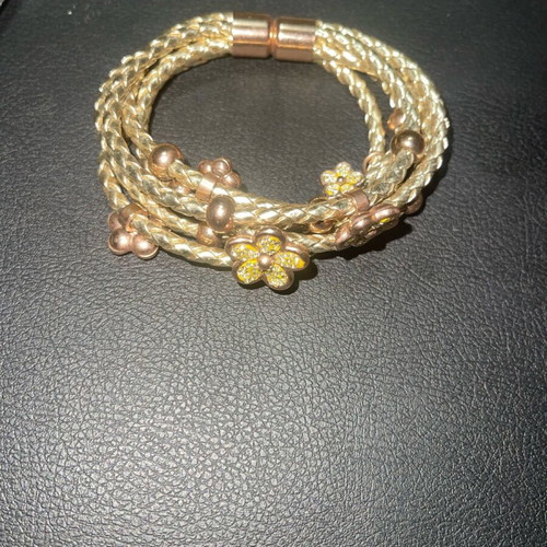 Magnetic bracelet used, yellow and gold colors
