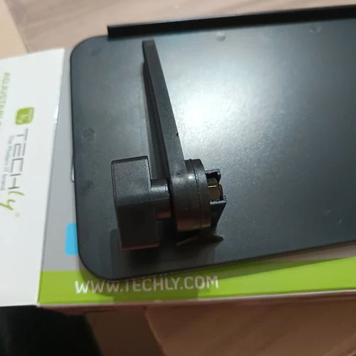 Adjustable Top Shelf for TV Screen new, black plastic