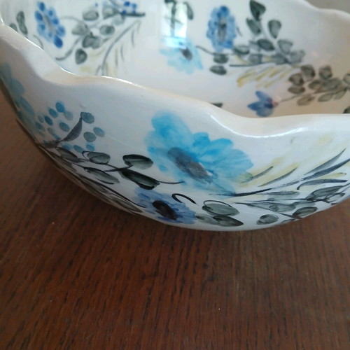 Hand-painted clay bowl like new with floral design