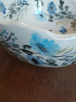 Hand-painted clay bowl like new with floral design