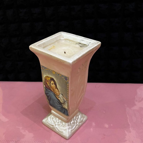 Decorative ceramic candle holder used with Virgin Mary and Christ