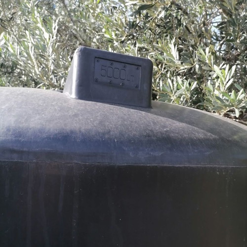 Black 5000-liter vertical cylindrical water and oil tank