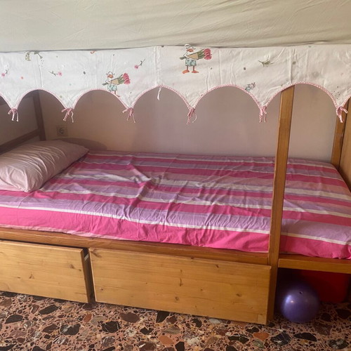 Kura bed used with convertible bunk and storage drawers