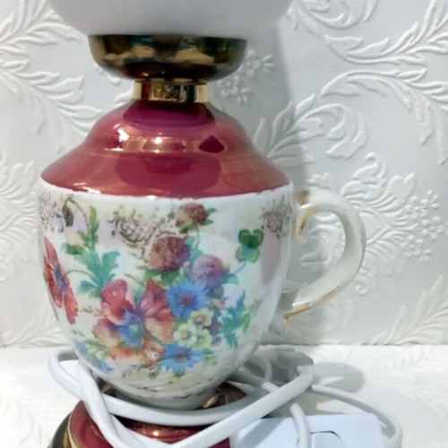 Electric ceramic vintage lamp used with floral decoration