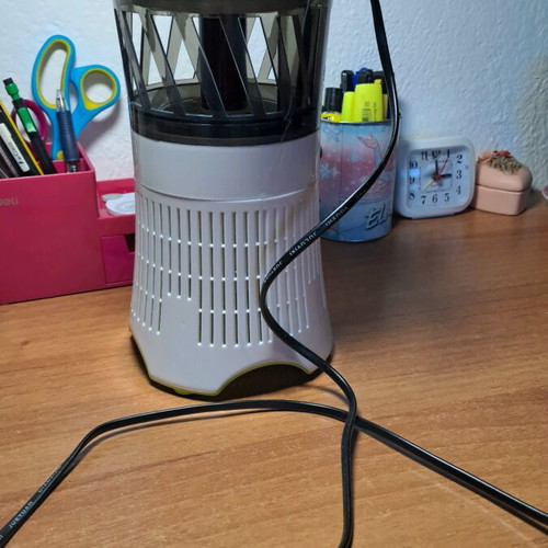 Electric insect trap used, works with power