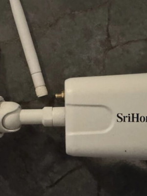 SriHome outdoor security camera like new, wifi and Ethernet