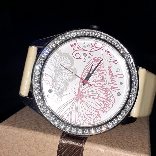 Morgan watch with replaced strap, functional with batteries
