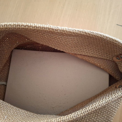 Woven magazine holder with wheels used