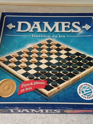 Wooden checkers used, complete set