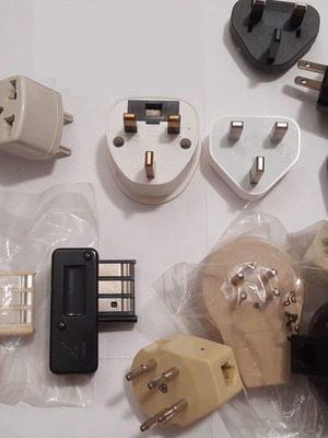 Electrical and telephone adapters used