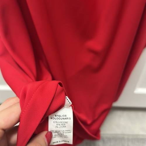 Mini dress with open back by Stelios Koudounaris, like new, red, size M