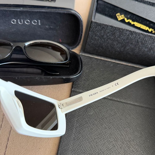 Prada and Gucci sunglasses set used