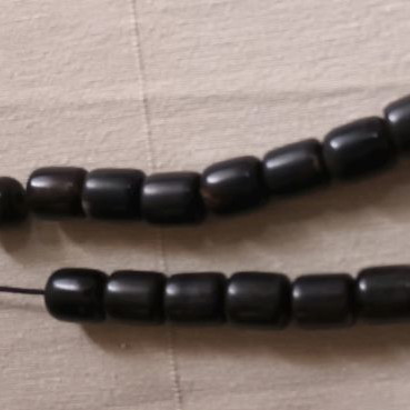 Worry beads bull horn black used, barrel shape
