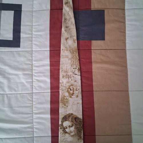 Tie with Da Vinci painting like new, beige
