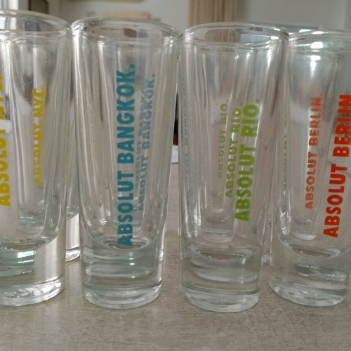 Collectible Absolut shot glasses with city names, like new