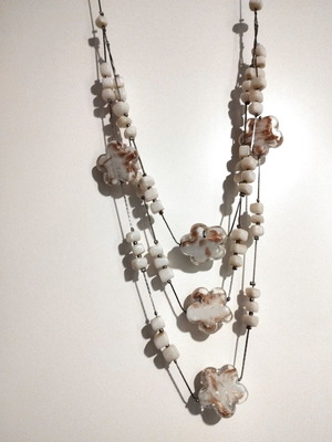 Necklace with triple strand glass flowers and beads new