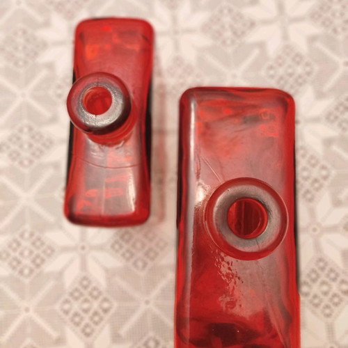 Set of two used decorative red glass vases made in Spain