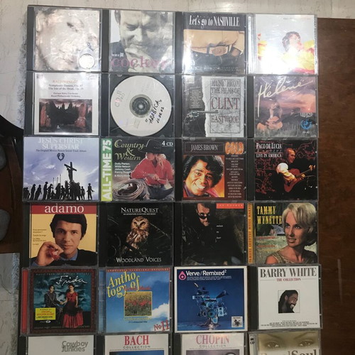 CDs of foreign music like new, 163 singles, doubles & triples