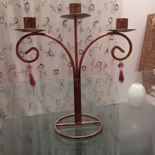 Metal candlestick with copper-bronze finish and purple beads, like new