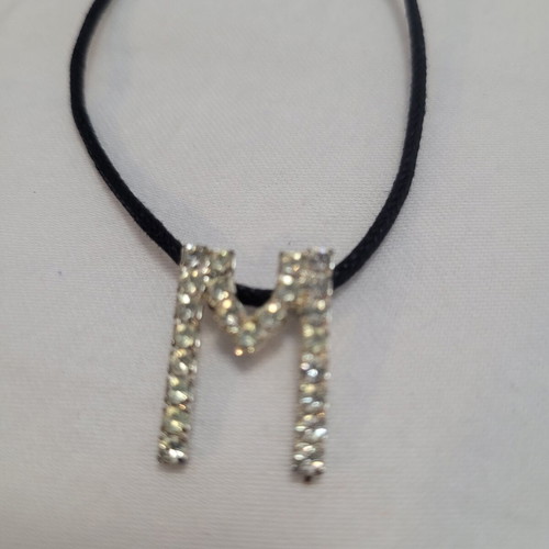 Women's necklace with 'M' monogram and rhinestones
