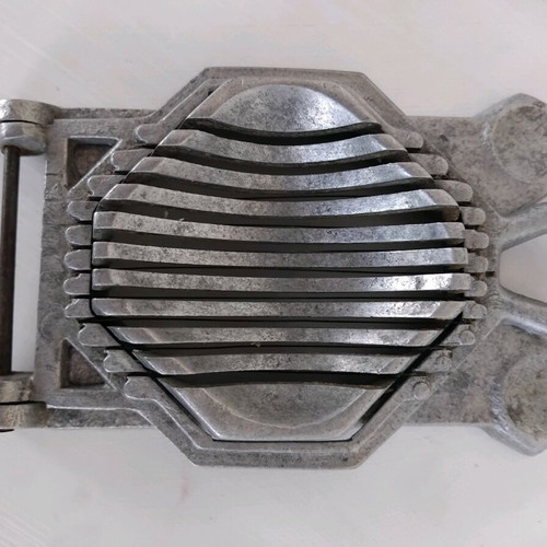 Vintage egg slicer used, aluminum and wire