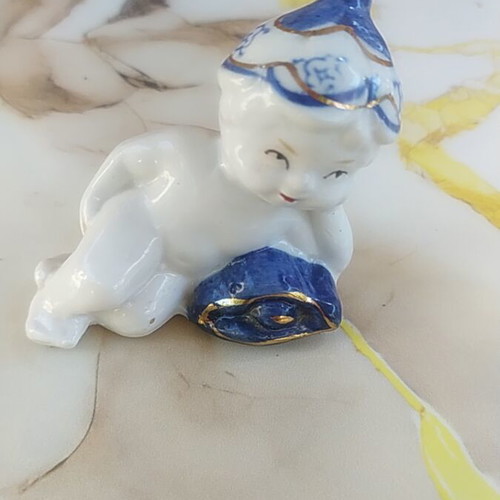 Vintage porcelain figurine small child design like new