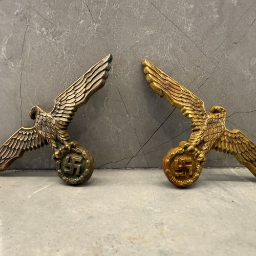 Pair of authentic German Kriegsmarine and Heer cap emblems used, WW2