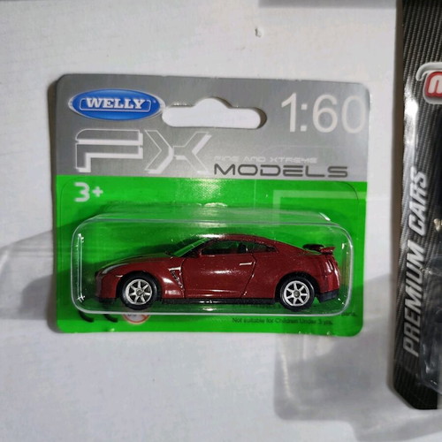 Set of 4 sport diecast cars new, various sizes