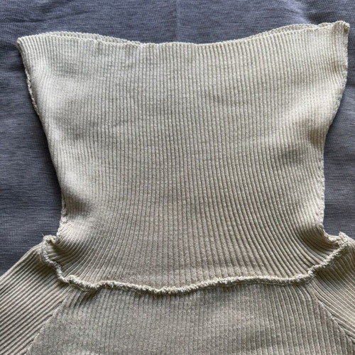 Zini sweater with high turned collar in cream color like new