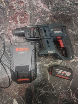 Bosch GPH 18V-21 SDS hammer drill used with 4A battery and charger