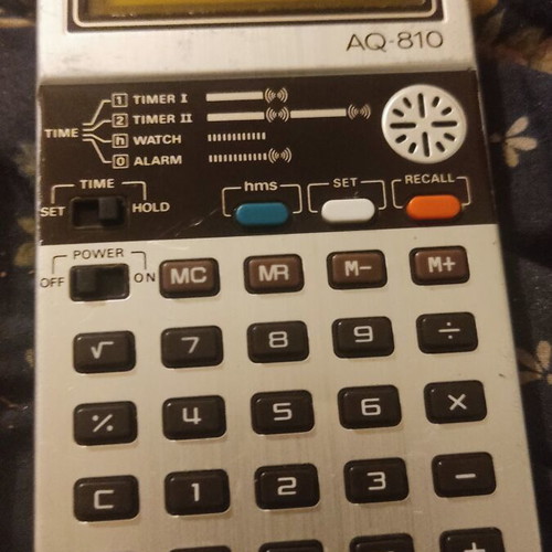 Collection of 6 handheld calculators including Casio, Sharp, and guitar tuner