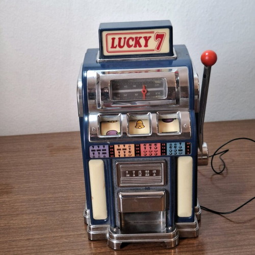 Marksman Las Vegas Lucky 7 AM/FM radio used, one armed bandit slot machine