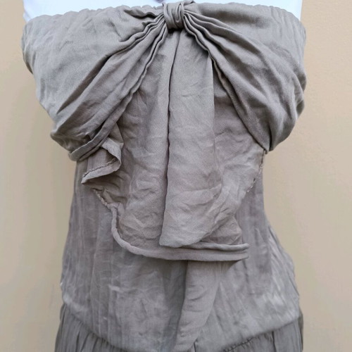 Strapless jumpsuit used, gray brown with bow and ruffles