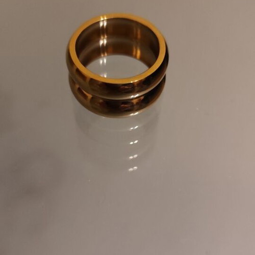 Gold ring stainless steel new, size 9
