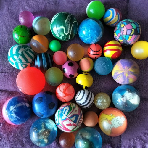 Collection of marbles in metal vintage box like new