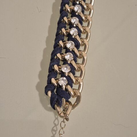Women's bracelet with gold chain, rhinestones & woven cord
