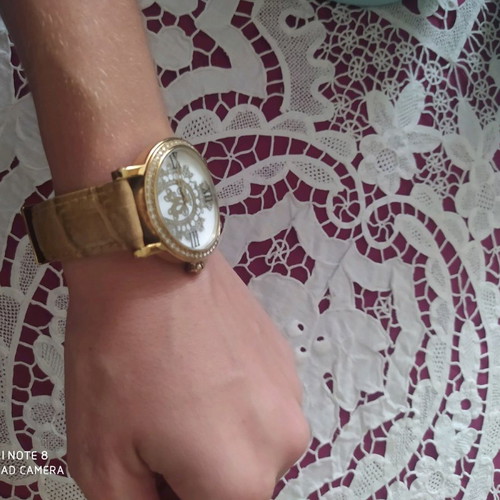 Juicy Couture watch like new with leather strap women's
