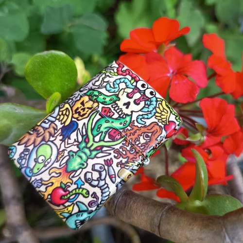 Zippo Crazy Collage Design lighter used with colorful 540 Color print