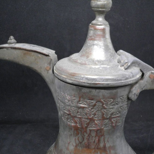 Antique copper coffee kanati used with engraved oriental designs