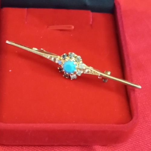 Vintage brooch with zircon and turquoise bead, used