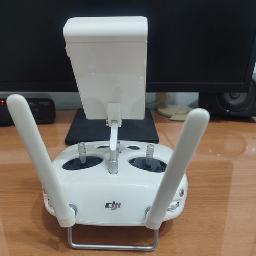 DJI Phantom 4 drone with accessories (no working batteries)