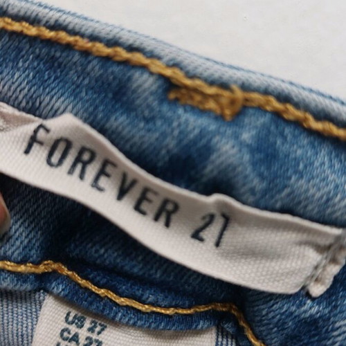 Forever 21 blue high-waisted crop flare jeans used with yellow seams