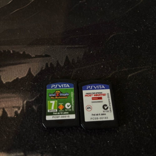 PlayStation Vita games pack with 4 games and 4GB memory card like new
