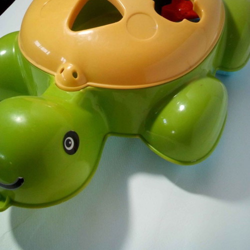 Interactive turtle toy Fisher Price used with shapes
